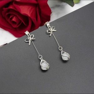 White opal colored drop post earrings